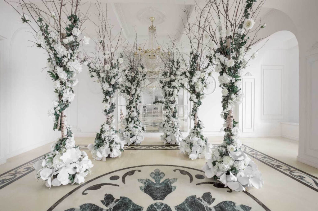 Group of white flowers in a room Group of white flowers in a room