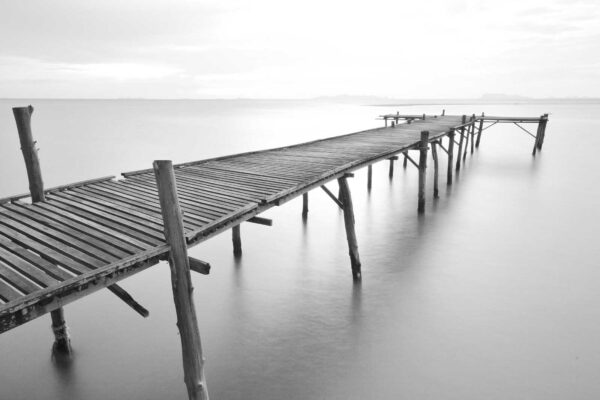 Long wooden bridge over water Long wooden bridge over water
