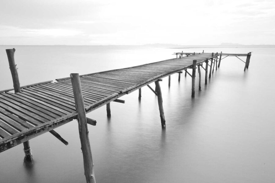 Long wooden bridge over water