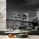 Wall murals Bridge over water with city skyline at night