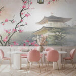 Wall murals Tree with pink flowers and a building in the background