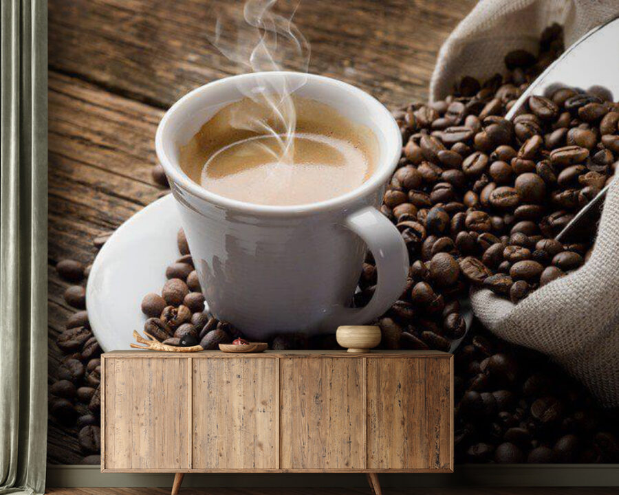 Cup of coffee on a saucer with coffee beans Cup of coffee on a saucer with coffee beans