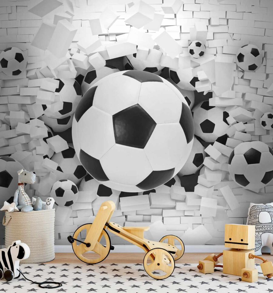 Group of football balls in a pile of bricks