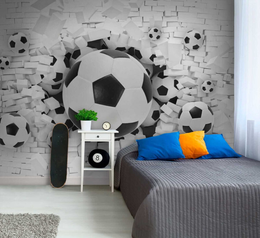 Group of football balls in a pile of bricks