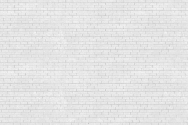 White brick wall with many small bricks White brick wall with many small bricks