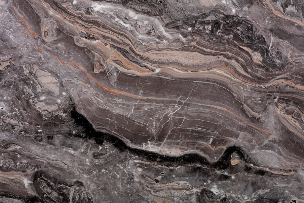 Textured stone with earthy tones Textured stone with earthy tones