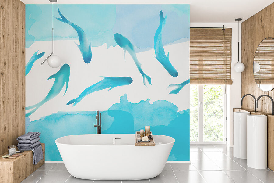 A group of blue fish swimming in water
