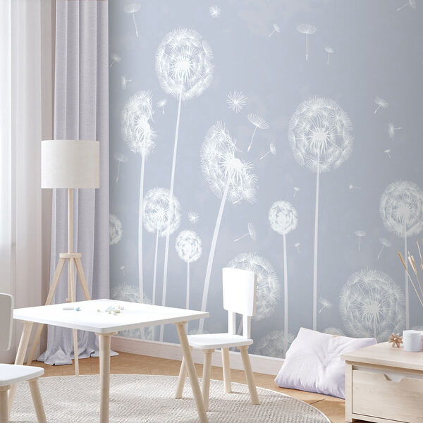 A white dandelions flying in the air A white dandelions flying in the air