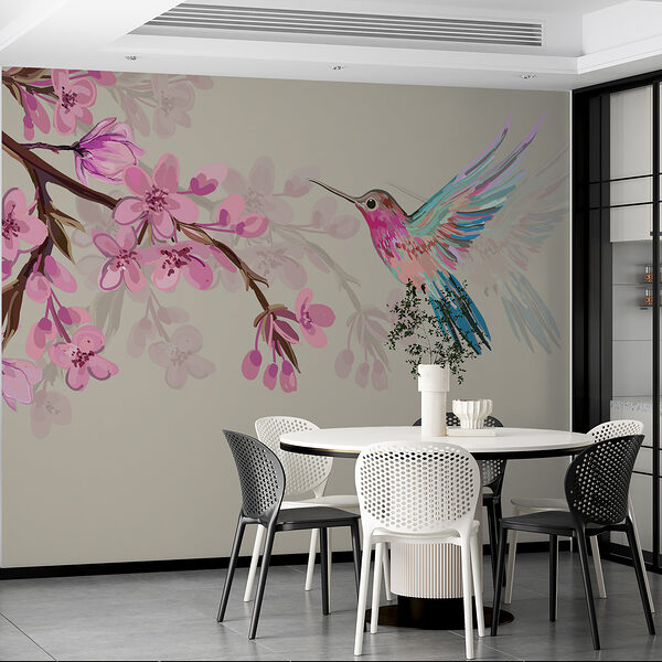 A bird flying next to a branch of flowers A bird flying next to a branch of flowers