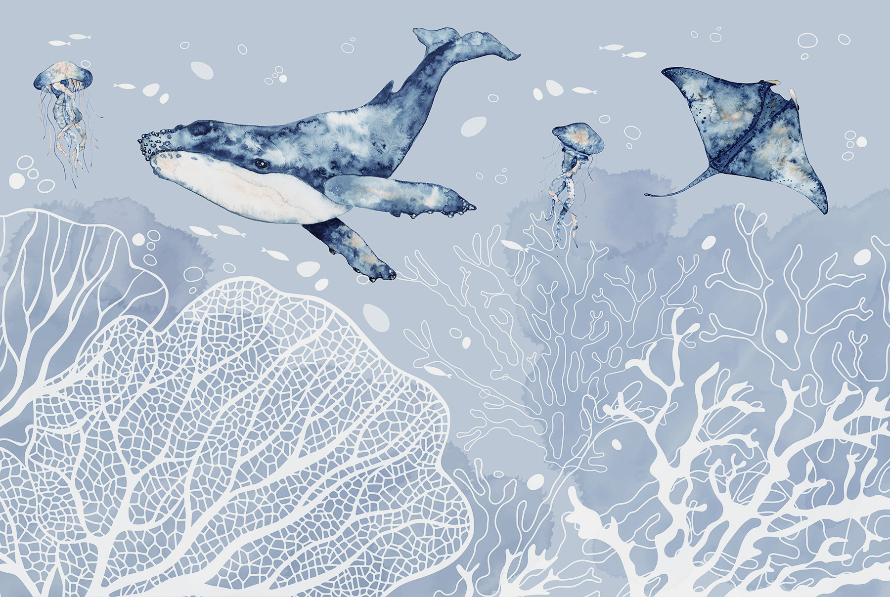 A whale and stingrays swimming in the ocean