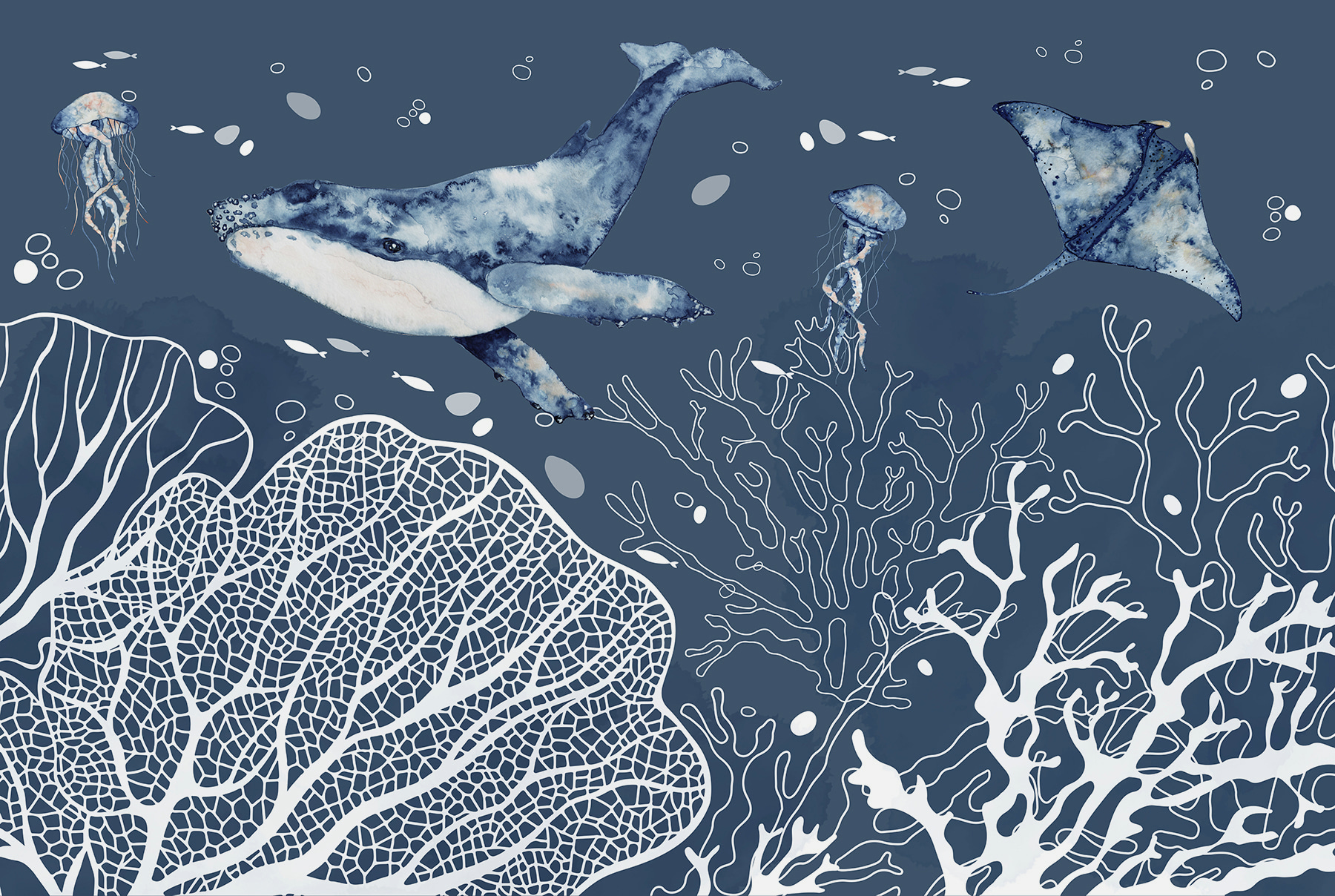 A whale and stingrays swimming in the ocean