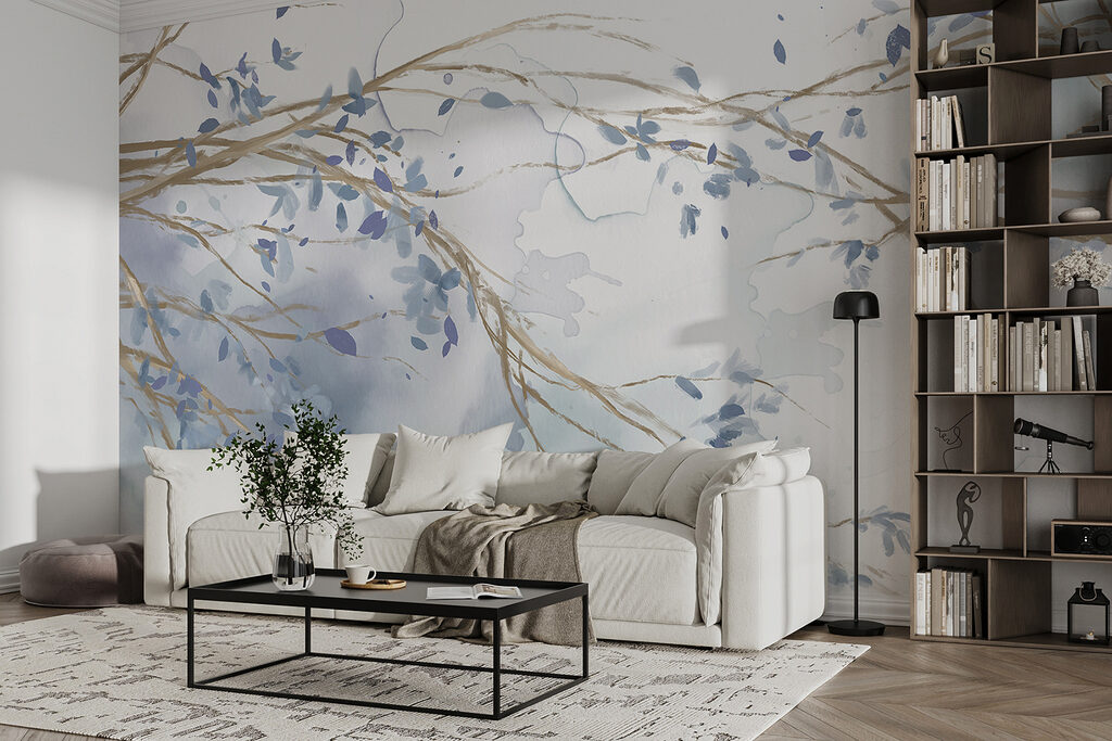 Watercolor of a tree branch with blue leaves