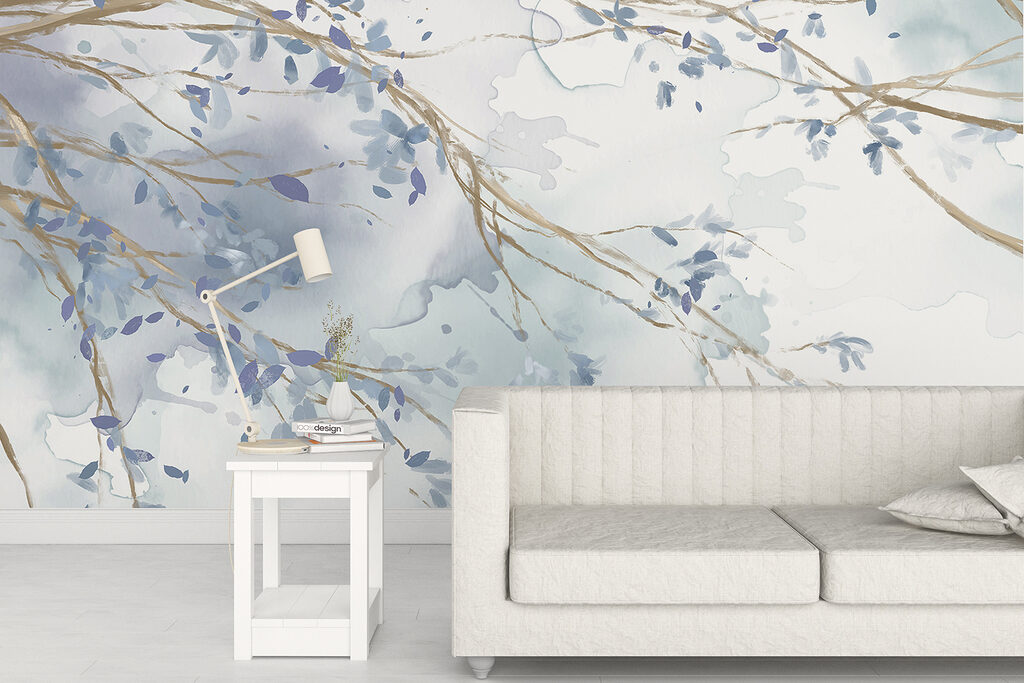 Watercolor of a tree branch with blue leaves