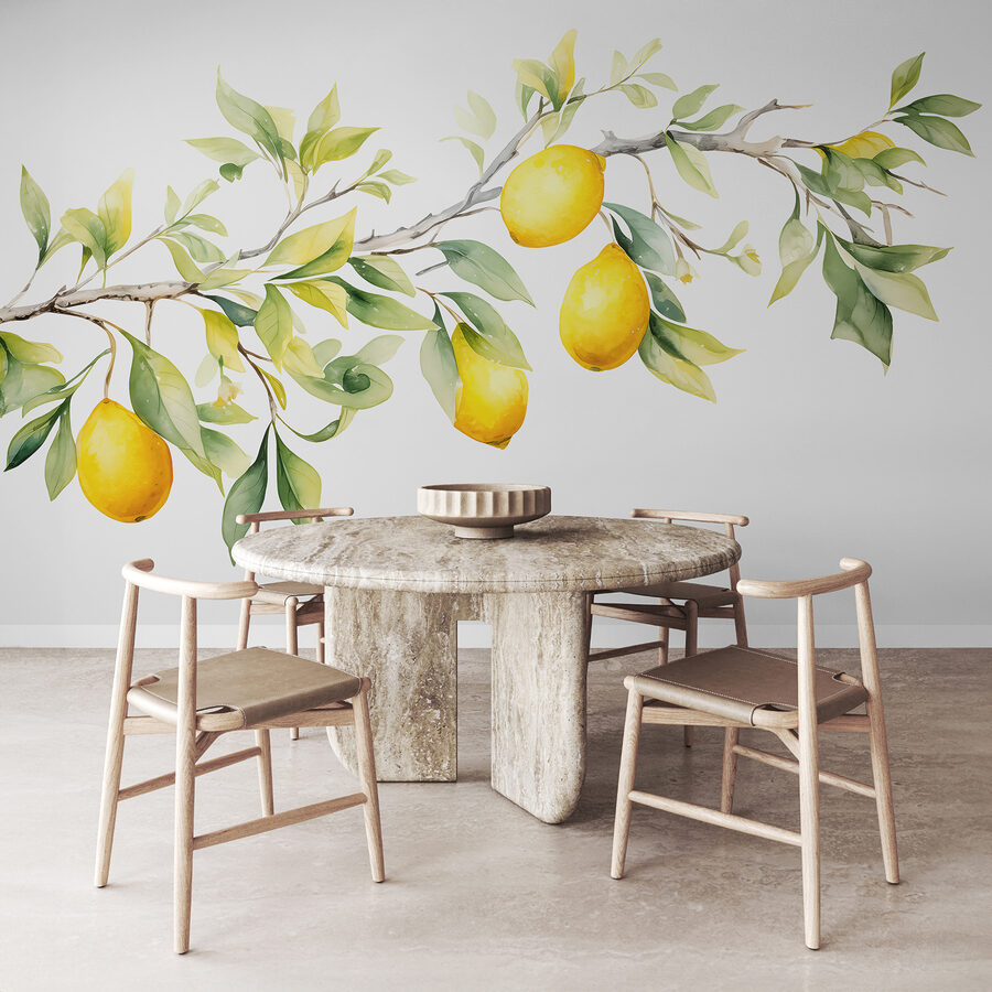 Branch of lemon tree with yellow fruits