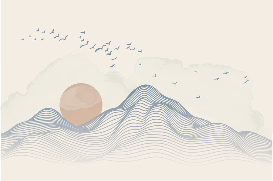 Sun and birds flying over a mountain