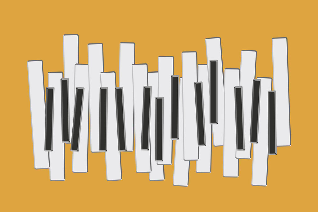 Piano keys on a yellow background Piano keys on a yellow background