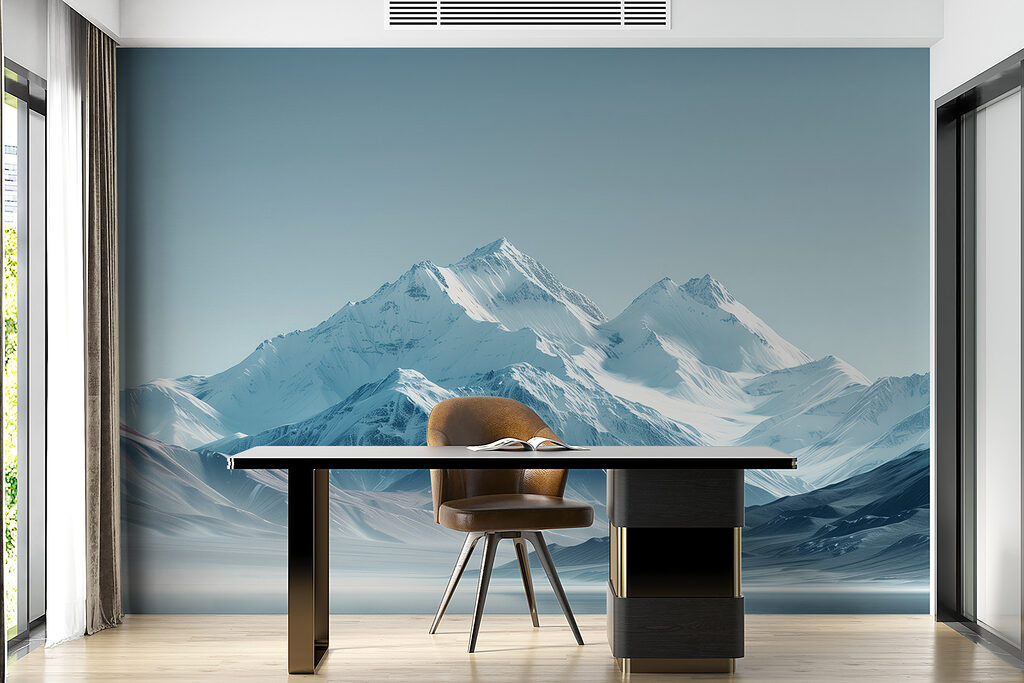 Snowy mountain range with a body of water