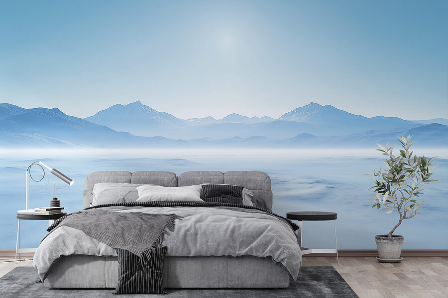 Snowy landscape with mountains in the distance