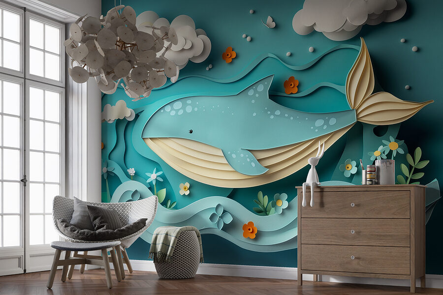 Paper cut whale in the ocean
