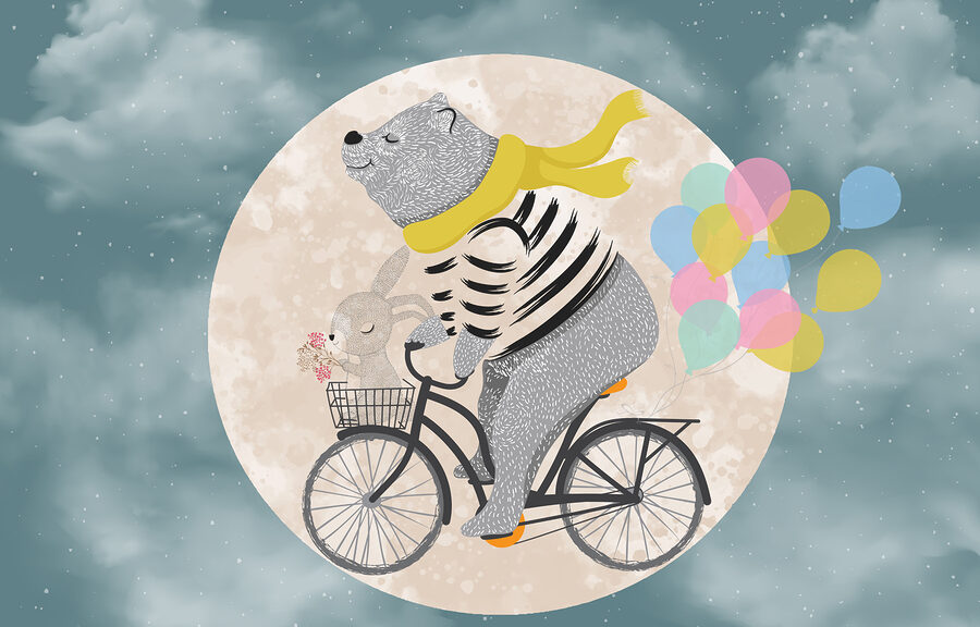 Bear riding a bicycle with balloons