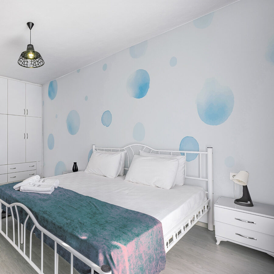 White surface with blue dots