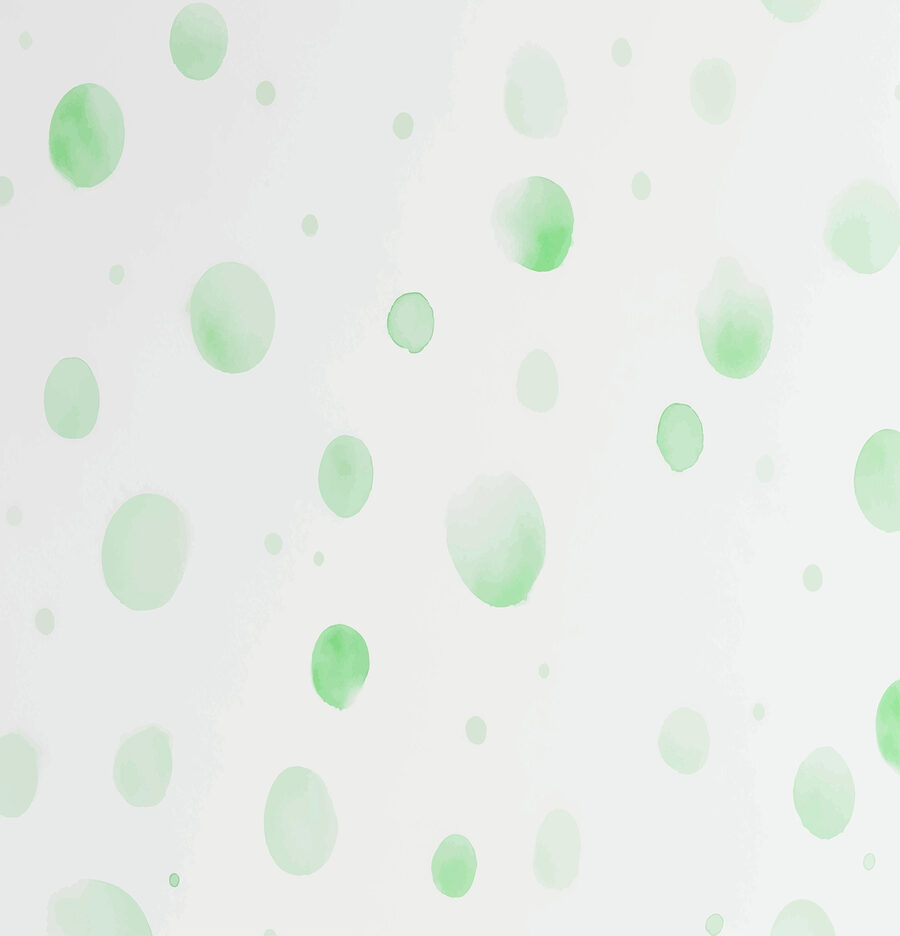 White surface with green dots