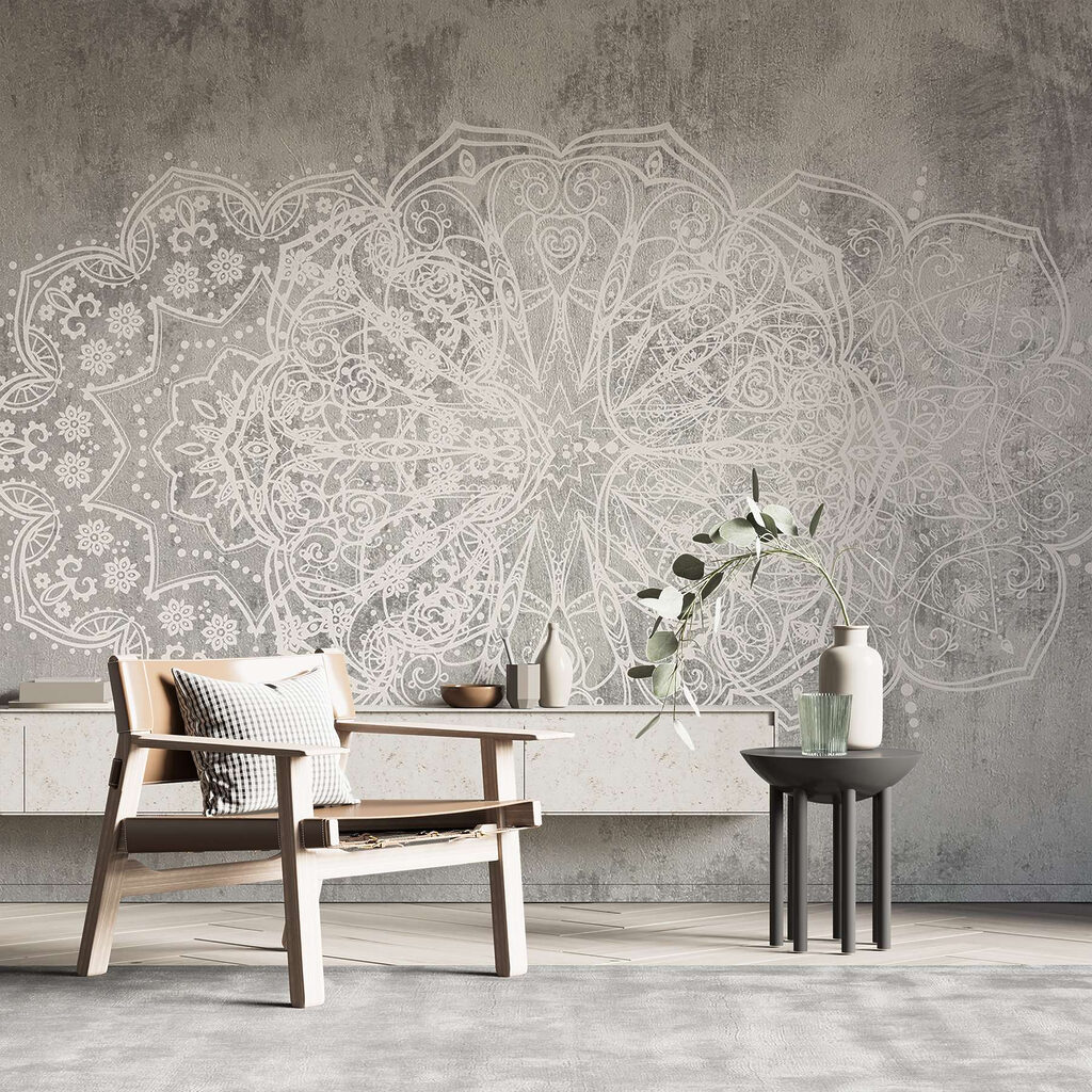 White ornate design on a grey surface White ornate design on a grey surface