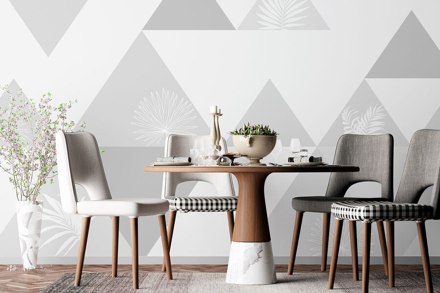 White and grey triangles with a pattern of leaves