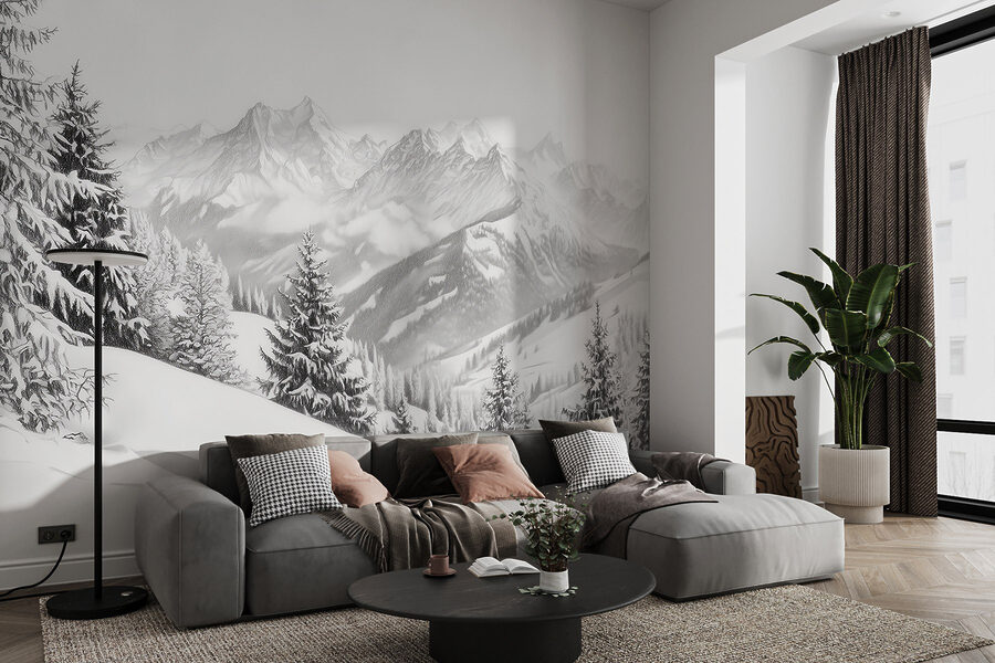 Snowy mountain with trees and mountains in the background