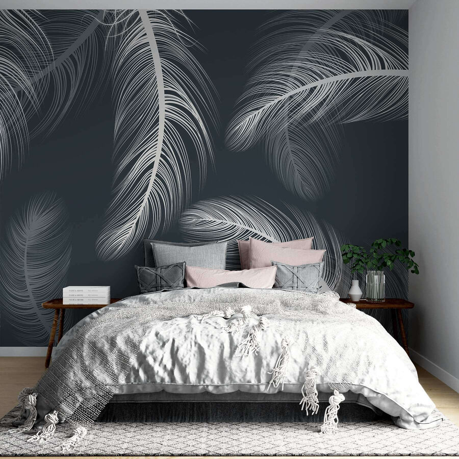 Delicate feathers dancing on dark background