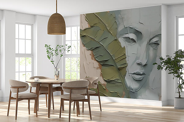 Painting of a face and a leaf Painting of a face and a leaf