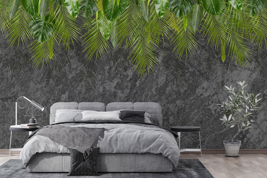 Group of green leaves on a grey background