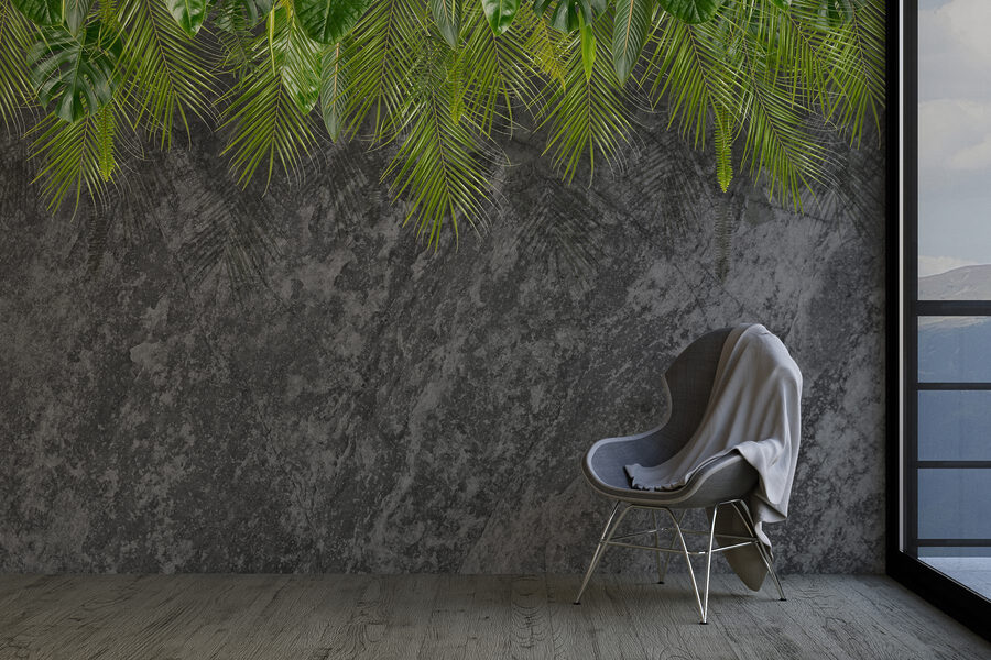 Group of green leaves on a grey background