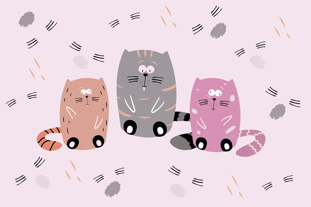 Group of cats sitting on a pink surface Group of cats sitting on a pink surface