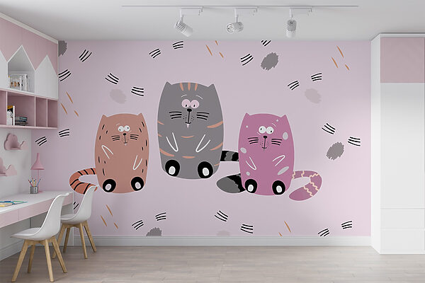 Group of cats sitting on a pink surface Group of cats sitting on a pink surface