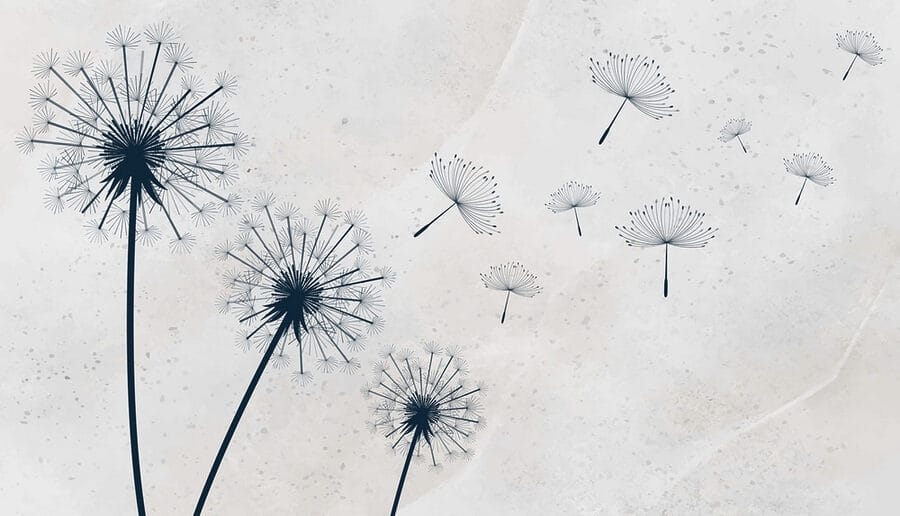 Group of dandelions flying in the air