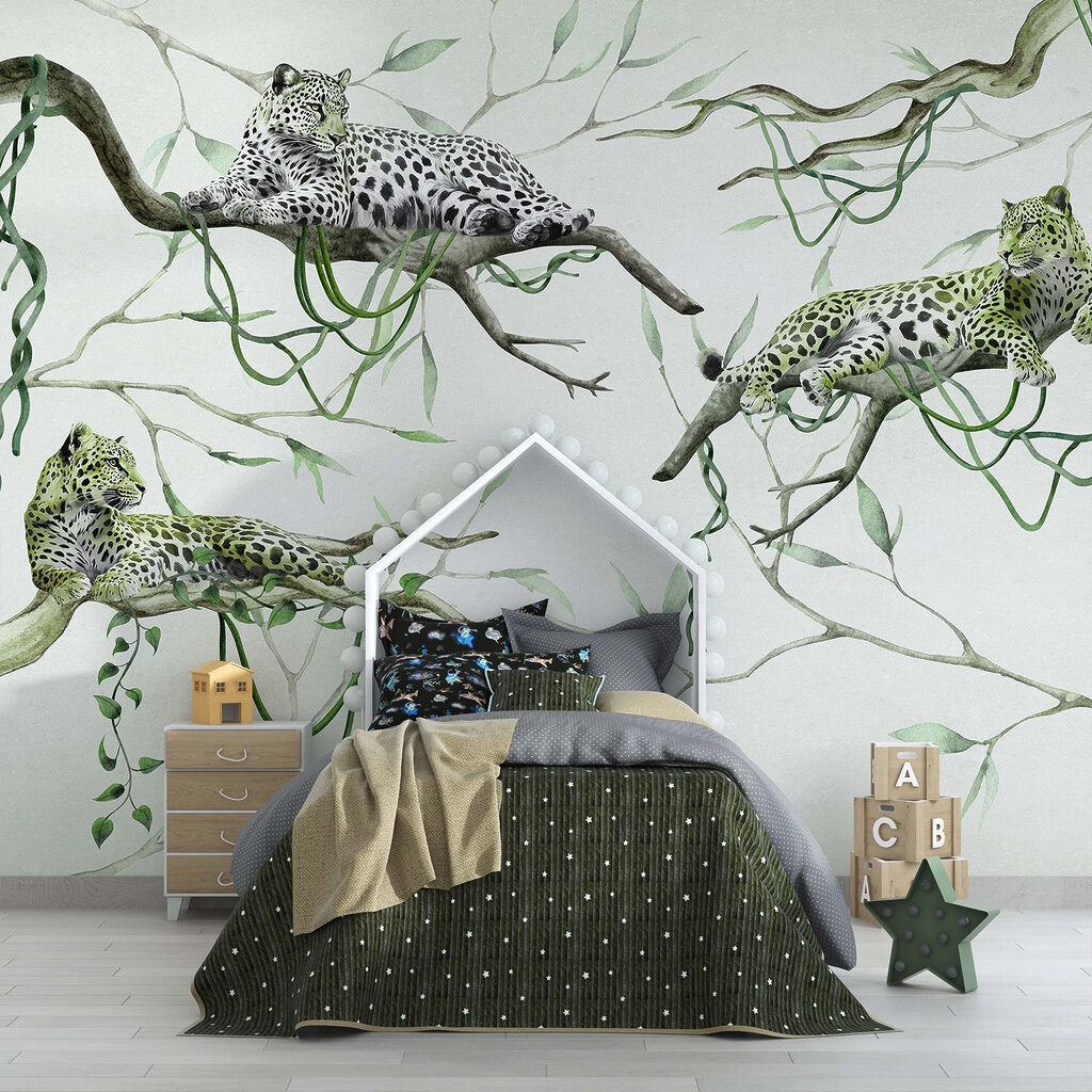 Group of leopards lying on branches