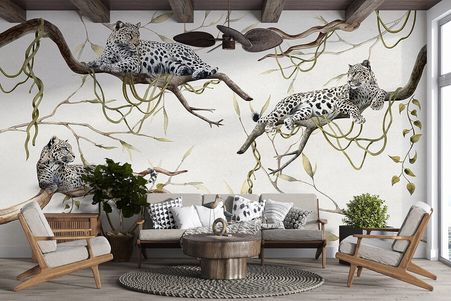 Group of leopards lying on branches