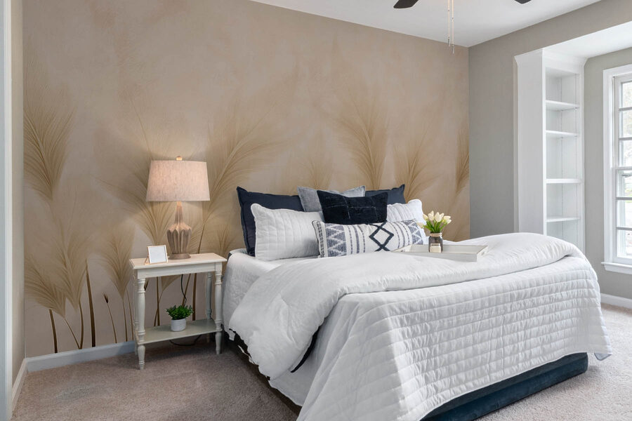 Wall murals Group of feathers on a beige background