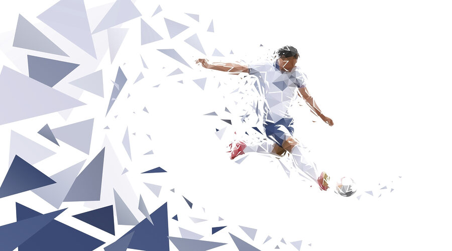 Man kicking a football ball