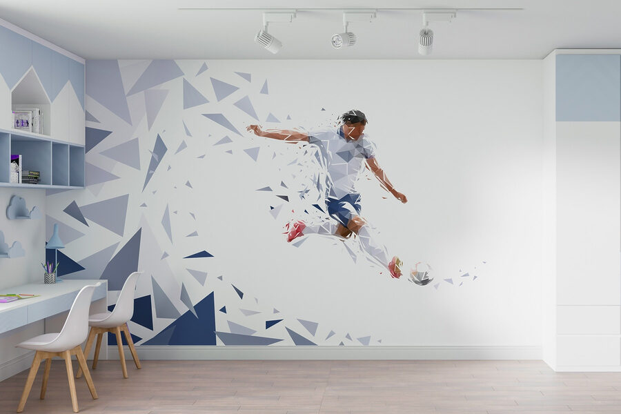 Man kicking a football ball