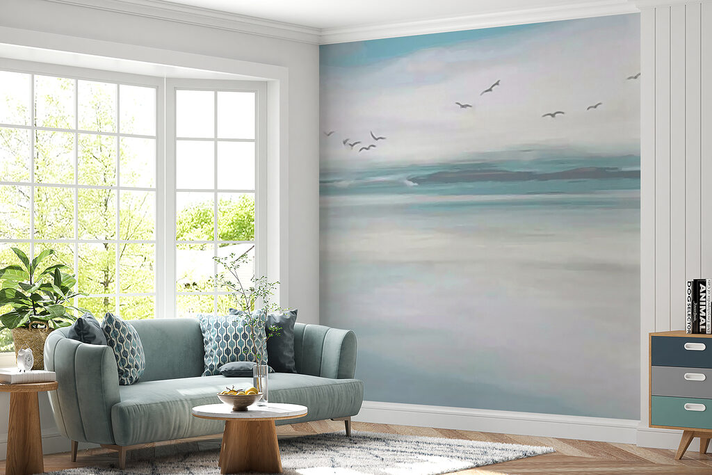 Birds flying over a body of water