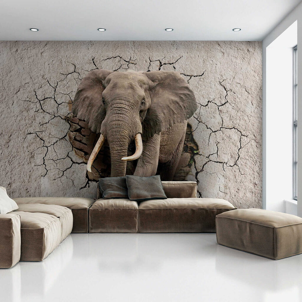 An elephant coming through a wall
