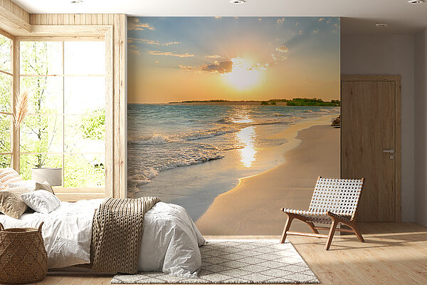 Beach with waves and a sunset Beach with waves and a sunset