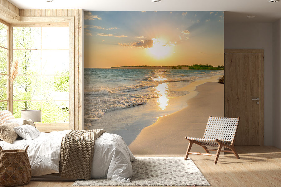 Beach with waves and a sunset Beach with waves and a sunset