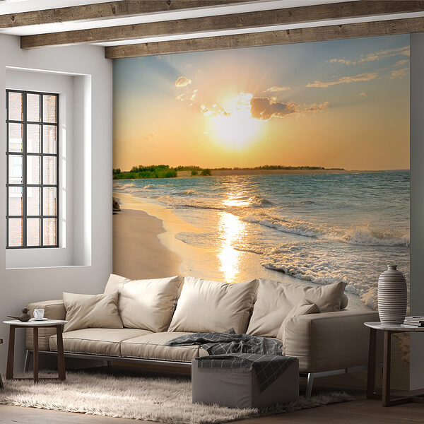 Beach with waves and a sunset Beach with waves and a sunset