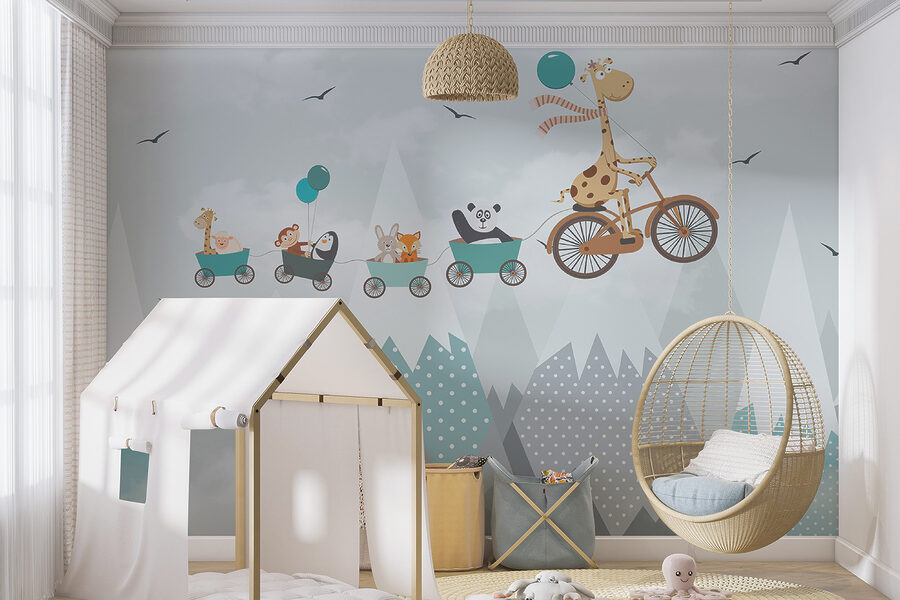 Giraffe riding a bicycle with a train and animals