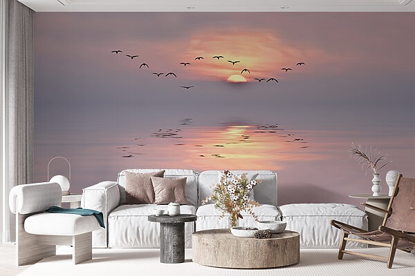 Flock of birds flying over water Flock of birds flying over water