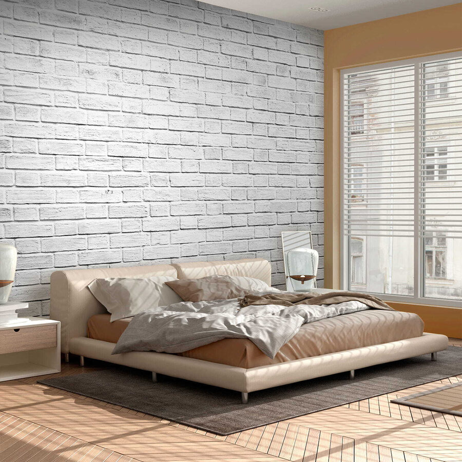 White brick wall with many small bricks