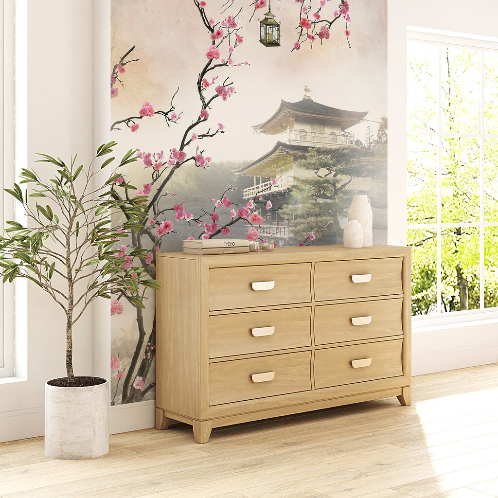 Tree with pink flowers and a building in the background